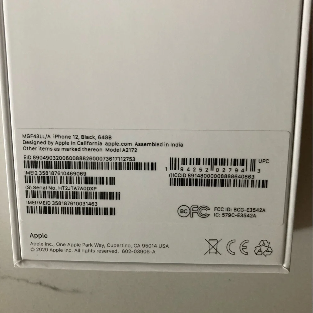 Apple iPhone 12 black 64GB product box and instructions
